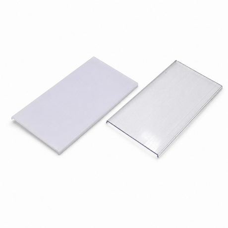 Two rectangular plastic sheets designed as diffusers for PLW80N, RPLW80, RPLW80-FL, and Alu-Triangle series profiles are displayed on a white background—one with a solid white, opaque finish serving as a diffuser and the other with a transparent surface allowing clear visibility through it.