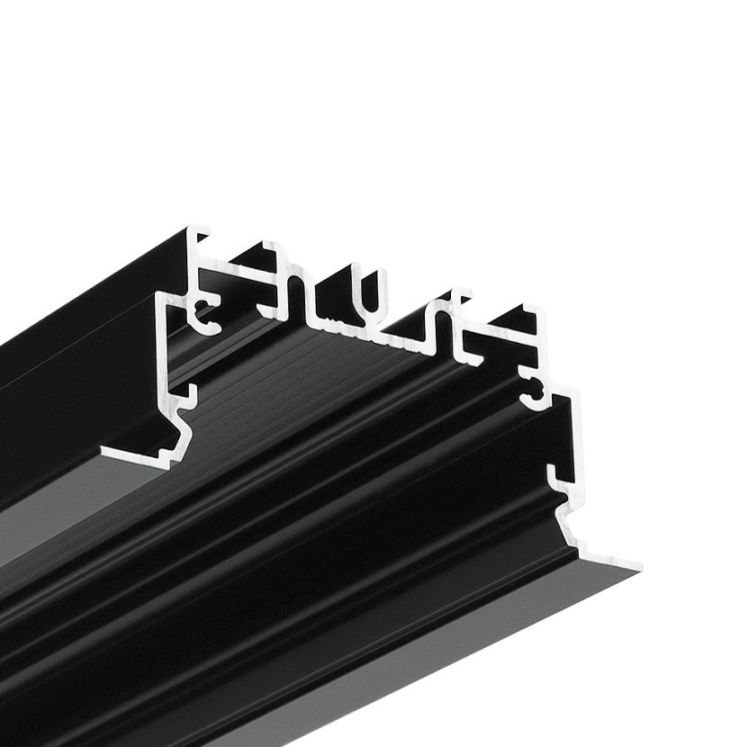 Close-up of the 2" Recessed Easy-Mounting LED Strip Channel (Model Phil.v2 Recessed), a black aluminum profile with intricate channels and grooves—perfect for seamless architectural framing or recessed LED strip installations.