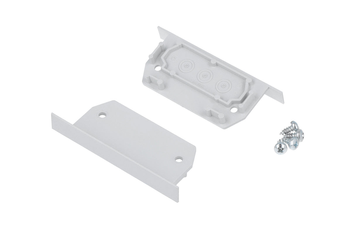 Two white plastic end caps with screws, designed for the Phil.v2 Recessed Profile. One end cap has a rectangular base with rounded edges; the other features a recessed design and circular markings, perfect for lighting fixture installation.