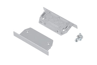End Cap for Phil.v2 Recessed Profile lighting fixture: includes two silver metal plates (one with raised edges and rectangular cutout, one flat with angled ends) and three small screws, all shown on a white background.