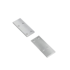 Two rectangular End Caps for Pixy20-02 Profile, each silver in color and featuring four screw holes, are placed diagonally on a white background.