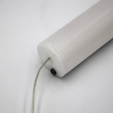 A close-up of the 1.5" White Surface-mount LED Tube Lighting Fixture (24V), Sierra38 Series, shows its cylindrical plug-and-play design with a transparent wire at one end, set against a plain white background.