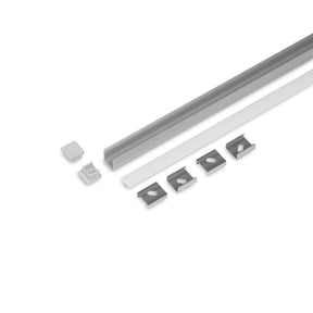 The Miniature Surface Mount LED Channel ~ Model Smart10 kit includes a long aluminum profile, frosted cover, two end caps, and four mounting clips—ideal for sleek interior lighting projects.
