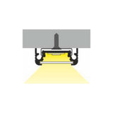 Diagram of a recessed ceiling light fixture emitting a yellow beam downward, shown in cross-section with a gray ceiling above and featuring the Surface Mount LED Strip Channel ~ Model Surface10 for sleek, efficient lighting integration.