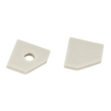Two small, flat beige plastic end caps for the Texas Mini Profile—one solid and one with a round hole—feature angled edges and are shown side by side on a white background.