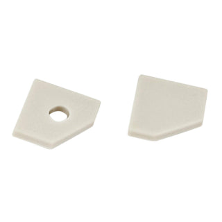 Two small, flat beige plastic end caps for the Texas Mini Profile—one solid and one with a round hole—feature angled edges and are shown side by side on a white background.