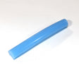 A small, cylindrical blue plastic tube lies on a white surface, resembling the Marsella Flexible Color Diffusers for LED Strip used in architectural lighting.