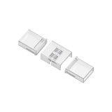 Three clear, rectangular plastic containers are shown on a white background. The center one, with compartments and a hinged lid, is perfect for organizing items like the RGB+CCT 6-Pin Wire Connector ~ UniColor IP67 COB Series; the other two have standard lids.