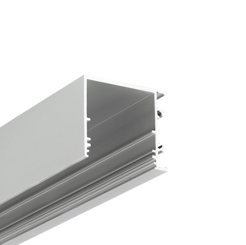 Close-up view of the 1.3" Surface Mount Side-Lighting LED Channel (Model Vario30-03), featuring a silver aluminum, rectangular hollow profile with ridged interior and open slot—ideal for architectural lighting. Isolated on white background.
