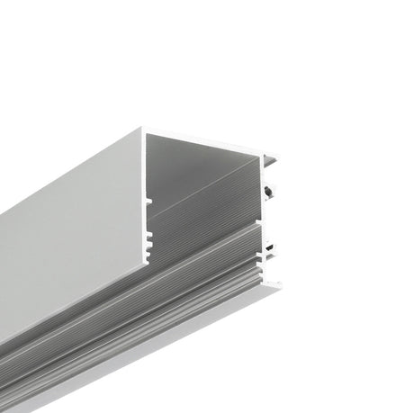 Close-up view of the 1.3" Surface Mount Side-Lighting LED Channel (Model Vario30-03), featuring a silver aluminum, rectangular hollow profile with ridged interior and open slot—ideal for architectural lighting. Isolated on white background.