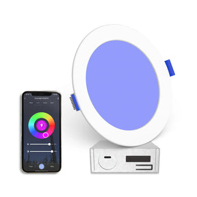 The 6 Ultra-Slim RGB+CCT Smart Wireless Downlight ~ EnoLED WSD-RGBCW-6, a round white fixture with a blue glow, is shown beside a smartphone displaying an advanced color wheel app for fully adjustable lighting.