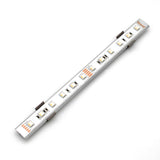 A close-up of the Surface Mount for Yukon Profile shows its slim, rectangular design with evenly spaced LED bulbs, mounted on a metallic base featuring integrated electronic components and surface mount accessories.