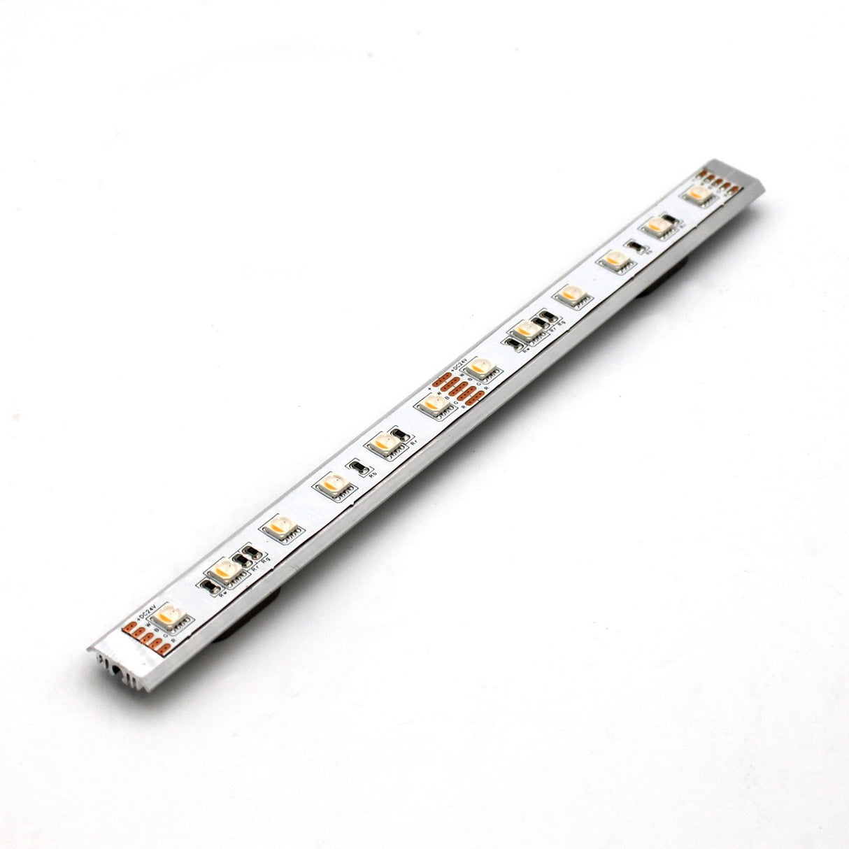 A close-up of an LED light strip on a slim rectangular circuit board is displayed against a white background, shown with the Surface Mount for Yukon Profile and related accessories.