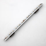 A slim, rectangular Yukon LED profile is displayed diagonally on a white background, featuring two Surface Mount for Yukon Profile accessories, locally 3D printed and attached underneath for surface installation.