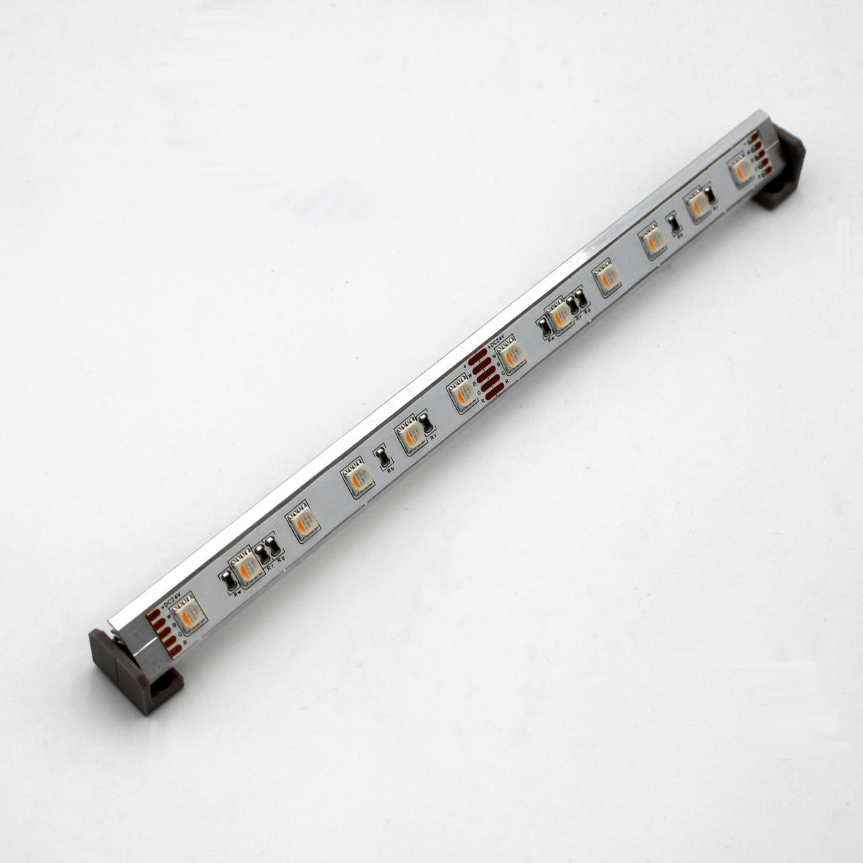The Surface Mount for Yukon Profile is a slim LED profile with a silver finish and black end caps, evenly spaced LED bulbs, and compatibility with locally 3D printed surface mounting accessories, shown on a plain white background.