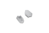 Two small white plastic C End Caps for Arc12 Duo Profile lighting fixture—each with angled sides—are shown on a plain white background; one end cap is facing up to display two pegs and a slot, while the other is facing down.
