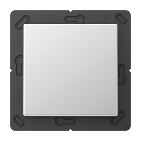 The Casambi 2-Channel Wireless Radio Transmitter, Model Jung BLE A 590, is a square white light switch with a black mounting frame labeled OPEN, TOP, and technical markings. This minimalist switch features Bluetooth Low Energy technology.