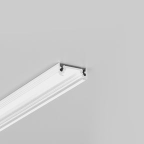 A white decorative molding or cornice, such as the Surface Mount LED Strip Channel ~ Model Surface10, is attached near the corner where the wall meets the ceiling, against a plain light gray background.