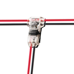 A 2-Pin T-Tap Solderless Wire Splice Connector ~ Pelican Series connects two red wires and one black wire in a T-configuration on a white background.