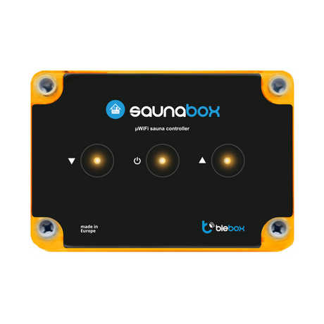 The Sauna WiFi Heating Controller ~ saunaBox by Blebox is a black rectangular smart unit with orange edges, three illuminated touch buttons, silver screws at each corner, and "made in Europe" plus Blebox logos on the front.