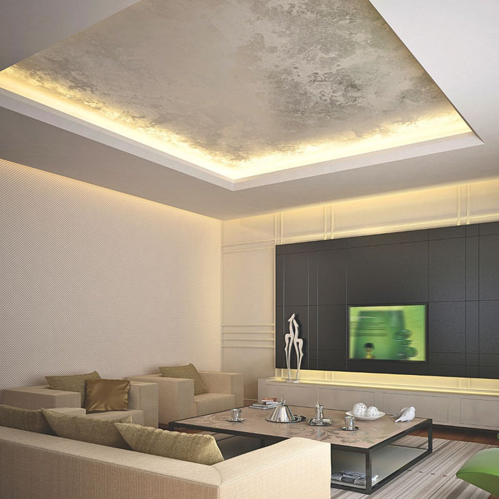 Living room with a recessed LED cove lighting a ceiling tray