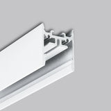 A close-up of the 1″ Suspended/Surface Mount LED Channel ~ Model Pixy20-01 showcases its modern, minimalistic white metal track system against a plain gray background; the sleek aluminum structure is ideal for versatile and stylish lighting solutions.