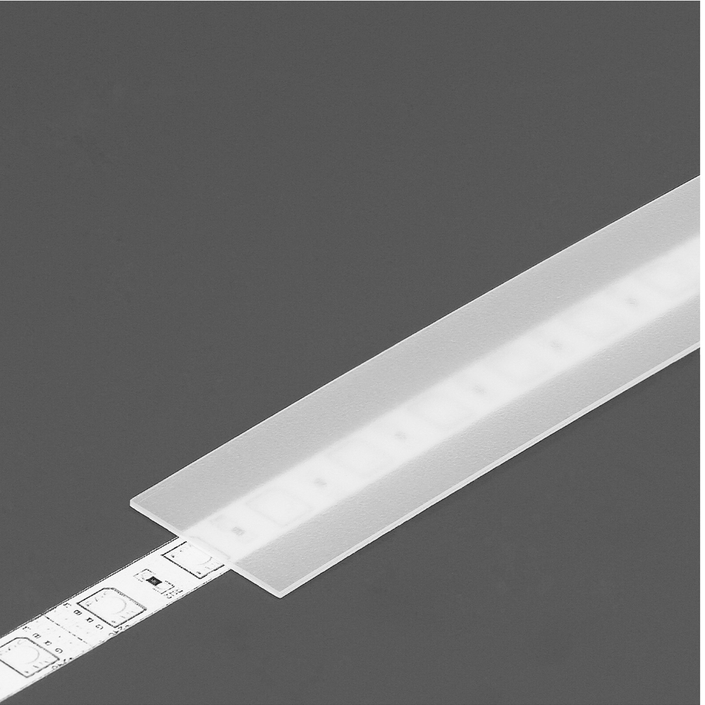 The LED Channel Cover ~ A6 Slide acts as a translucent slide-in diffuser over an LED strip on a gray background, softening the look of individual LEDs in this corner profile.