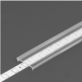 A close-up of the LED Channel Cover ~ C6 Click, a transparent plastic channel with a frosted diffuser partially covering a white LED strip, shown against a plain gray background.