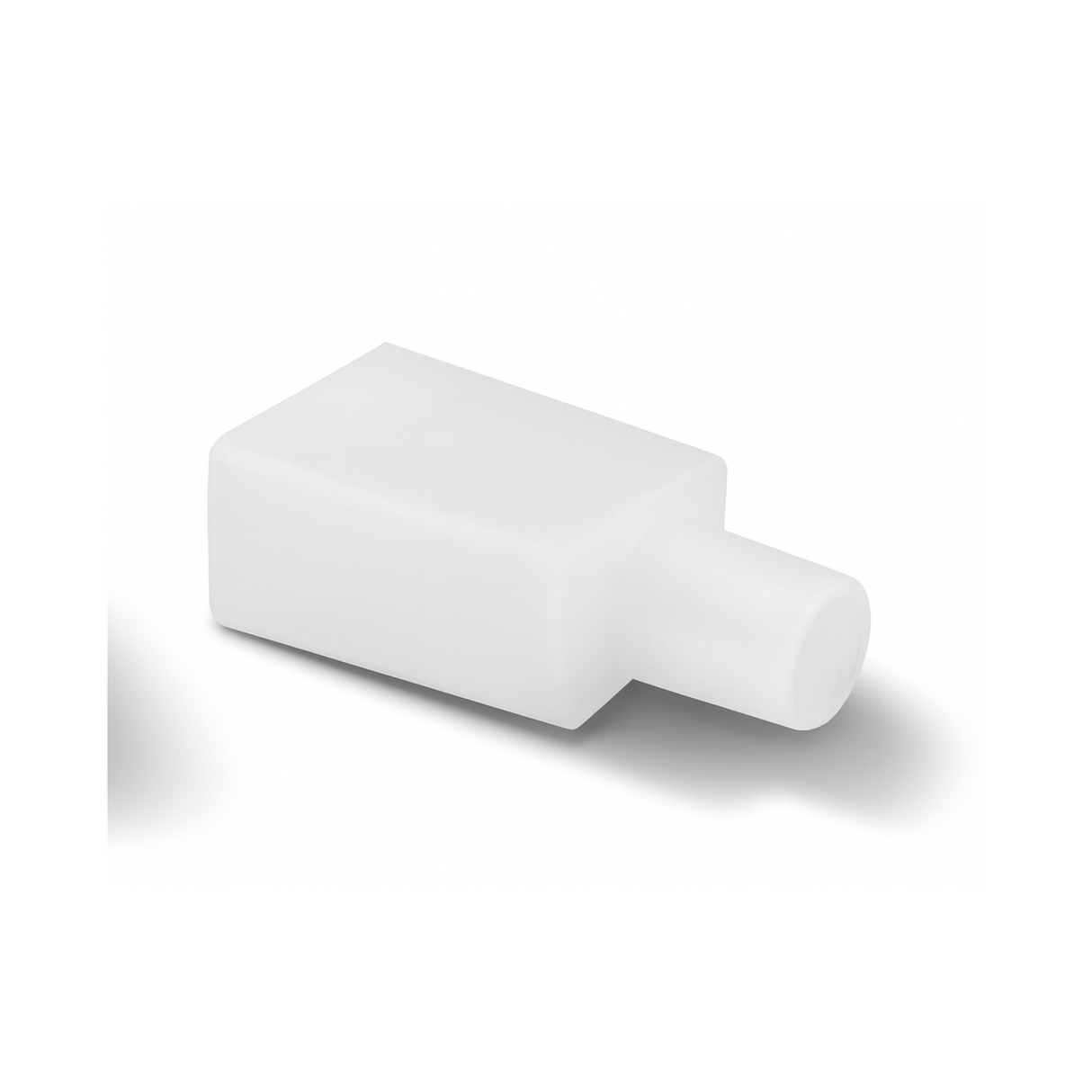 The End Cap for Neon Flex Ultra Slim Series, a white rectangular plastic cap with a cylindrical extension and IP44 Ingress Protection, is shown lying on its side against a plain white background.
