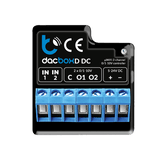 A black and blue Smart WiFi 2-Channel 0-10V Controller (Model dacBoxD DC) features labeled input, output, and power terminals, visible connection ports, and company branding on the top surface.