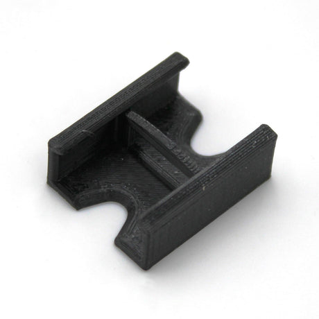 A compact, black, 3D-printed Linear Connector for SL7 Profile featuring parallel side walls and a central groove, shown on a white background.