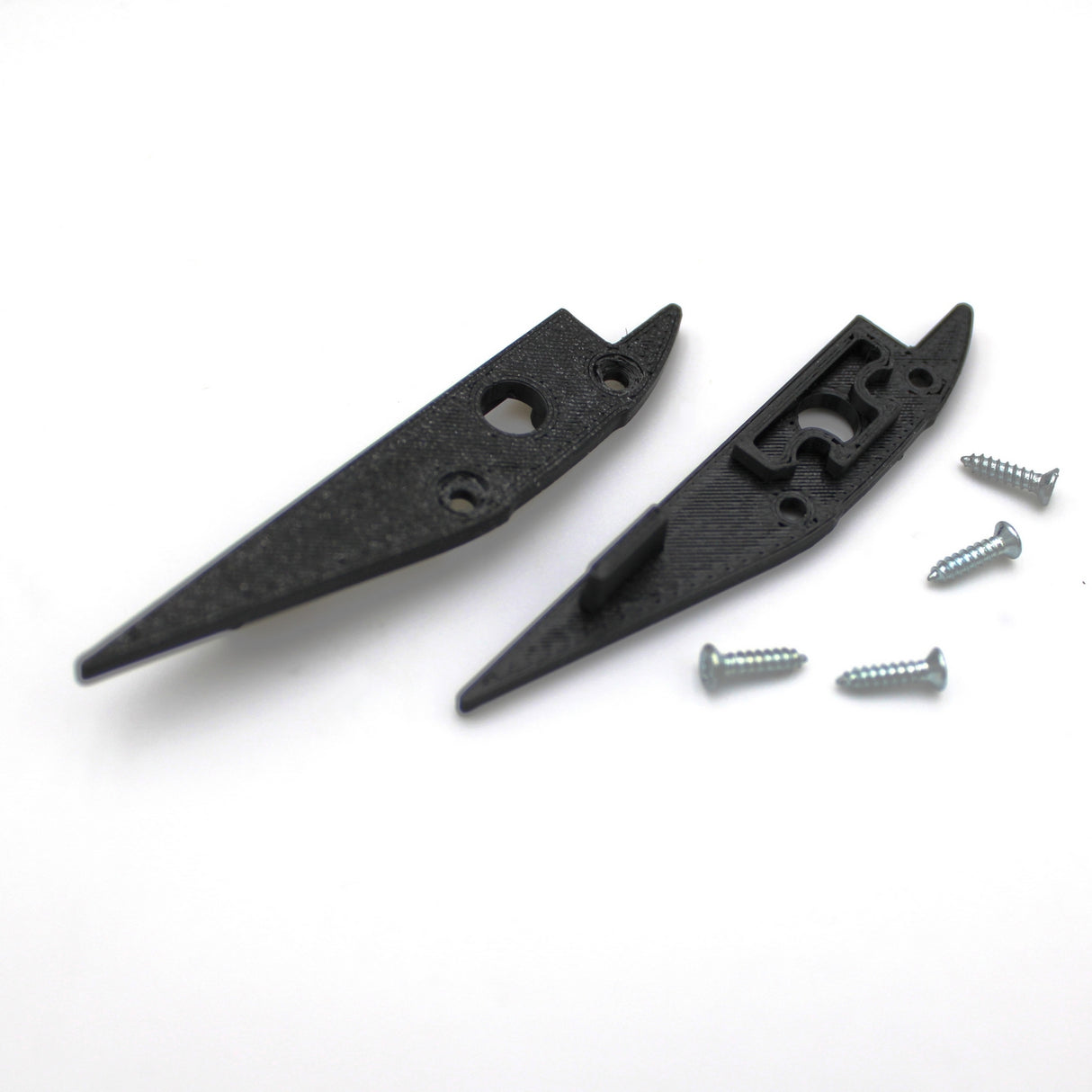 Two End Caps for Broadway Profile, made of black plastic with pointed ends, are shown open next to four silver screws, all displayed on a white surface.
