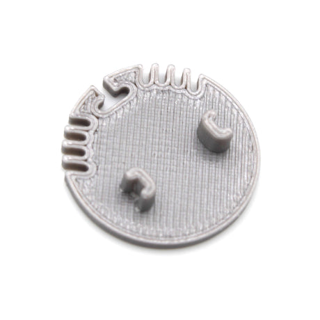 A gray, textured plastic End Cap for Alu Round Profile with small raised sections, top-edge notches, and a possible cable hole; likely a 3D-printed component designed to fit Alu Round LED profiles.