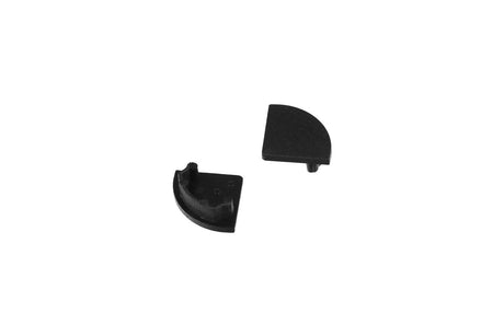 Pair of small black plastic End Caps for D1 Click Cover with pegs, spaced apart on a white background—perfect for finishing LED channels.