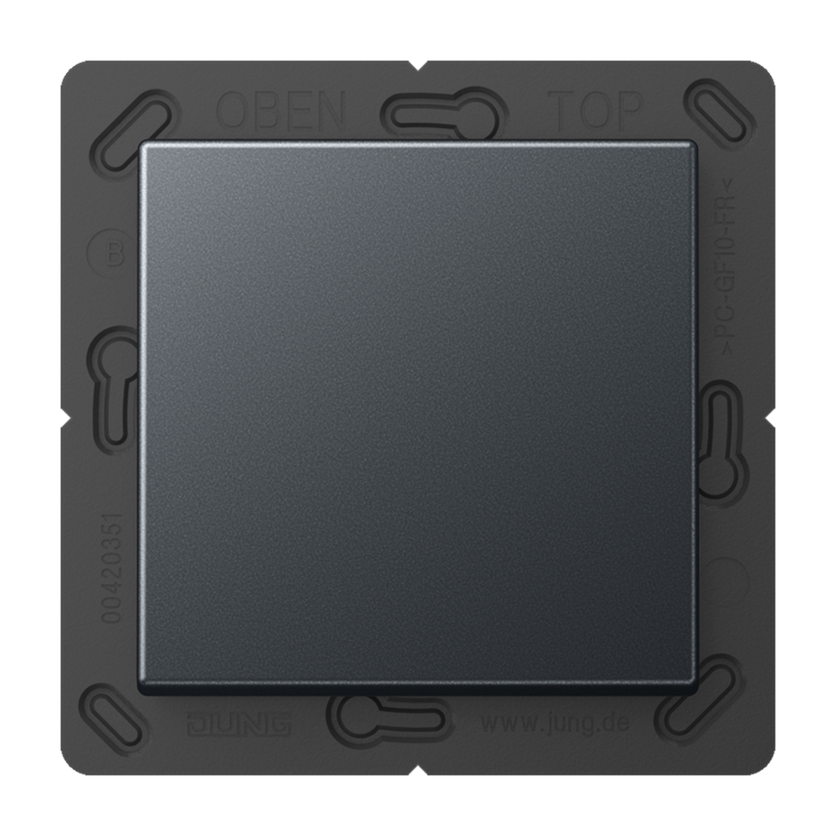 A close-up view of the Casambi 2-Channel Wireless Radio Transmitter (Model Jung BLE A 590), a square, dark light switch mechanism with energy harvesting, OPEN and TOP embossed on the frame, and a plain central button.