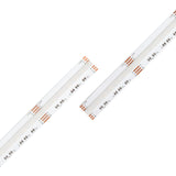 Two EnoLED UniColor Series RGB+CCT COB IP20 High CRI LED Strips (24V) are displayed diagonally on a white background. Each strip features visible copper contacts and evenly spaced, surface-mounted LEDs, emphasizing their tunable white light and multi-color illumination capabilities.