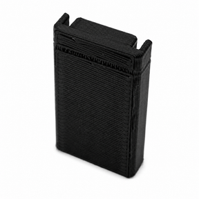 A black, rectangular Plastic End Cap for Hannover Profile made of PETG, featuring textured horizontal lines and two raised top edges, shown against a white background.