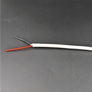 2-core wire with red and black strands on a gray background