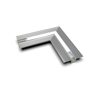 A metallic Connector for Hide10 Profile, L-shaped with a ridged surface and open channels for LED channels, shown on a white background with a slight shadow.