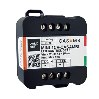 The MINI-1CV-CASAMBI is a black, rectangular Miniature 1-Channel LED Dimmer with Casambi, featuring screw terminals, labeled input/output, DALCNET and CASAMBI branding, and Casambi App compatibility for simple LED lighting control.