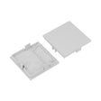 Two light gray square plastic End Caps for the Phil.v2 Profile—one reveals internal ridges and symbols, the other a smooth exterior—perfect for finishing your lighting fixture.