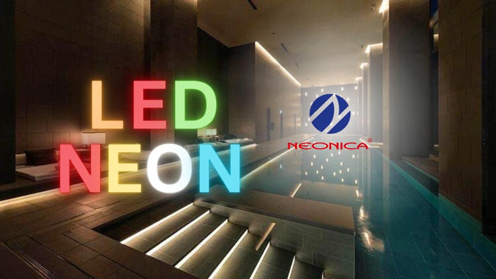 LED NEON sign lettering by Neonica glowing above a lit staircase