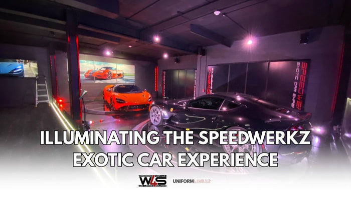Exotic car showroom at Speedwerkz with architectural LED lighting highlighting vehicles