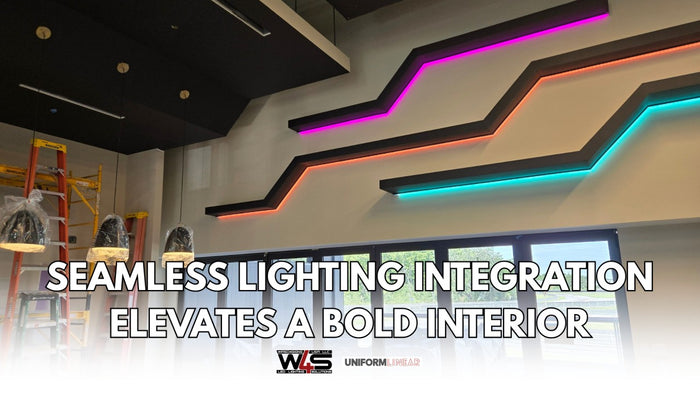 Interior space with recessed and surface-mounted LED channel lighting integrated into architectural lines