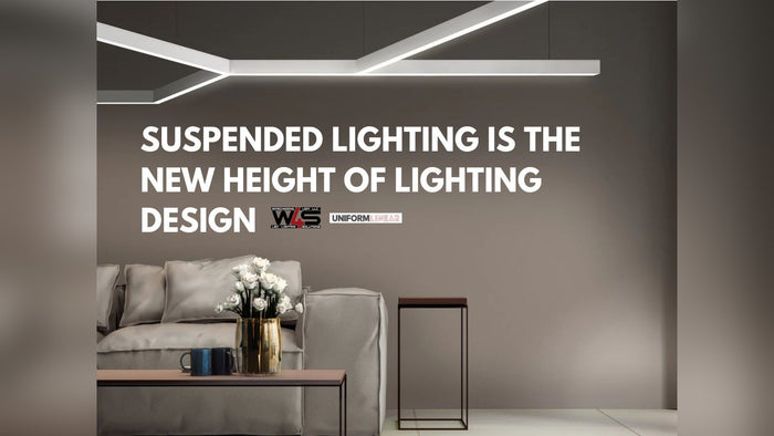 Suspended aluminum LED hanging profile installed over a high ceiling in a commercial space