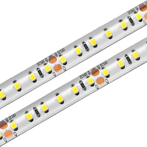 Close-up view of two parallel White High CRI IP68 LED Strip (24V) ~ Sauna Pro White Series, each featuring small yellow LEDs and electronic components mounted on a flexible white strip.