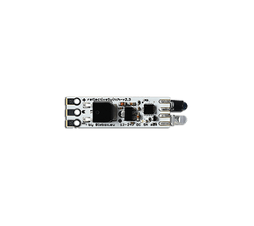 The Miniature Proximity Sensor Switch for LEDs ~ reflectiveSwitch by Blebox is a compact circuit board with pins, a sensor, and black chip—perfect as a mini light sensor switch—shown on a white background.