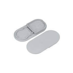 A pair of gray D9 End Caps for the Nami23 Profile—one oval with a raised border and notches, the other smooth and flat—displayed on a white background.