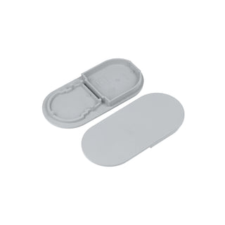 A pair of gray D9 End Caps for the Nami23 Profile—one oval with a raised border and notches, the other smooth and flat—displayed on a white background.