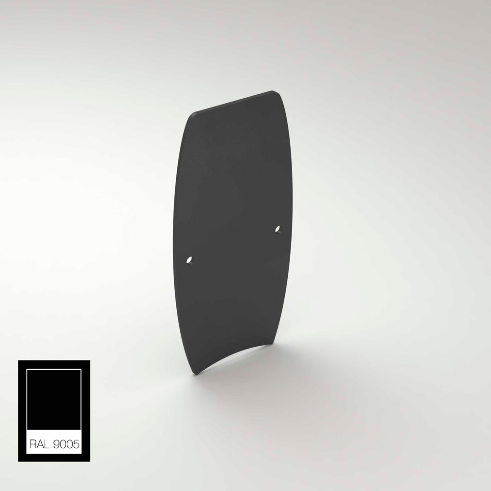 A black aluminum End Cap for Ricardo Profile, with a curved rectangular shape and two small holes, stands upright on a light gray surface. A RAL 9005 paint swatch in the bottom left corner shows its solid black color.